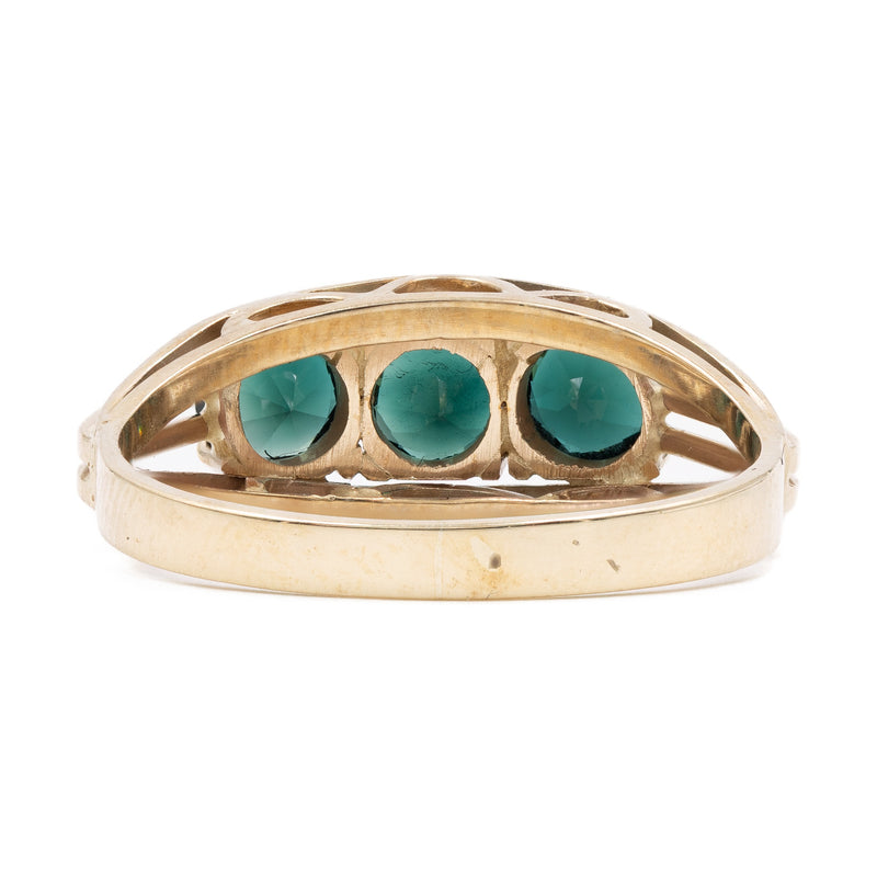 Anello trilogy vintage in oro giallo 8k con spinelli sintetici verdi
