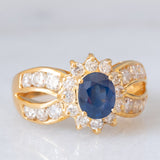 Un’alba sul mare - Anello vintage a fascia e a margherita in oro giallo 18K con zaffiro e diamanti