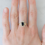 Anello a margherita vintage in oro giallo 14K con zaffiro (0.70ct ca.) e diamanti (0.20ctw ca.), anni ‘80