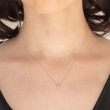 Collana vintage in oro bianco 10K con ciondolo punto luce con zaffiro rosa e diamante