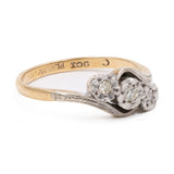 Anel vintage em ouro amarelo 9K e prata com design de três peças e diamantes.
