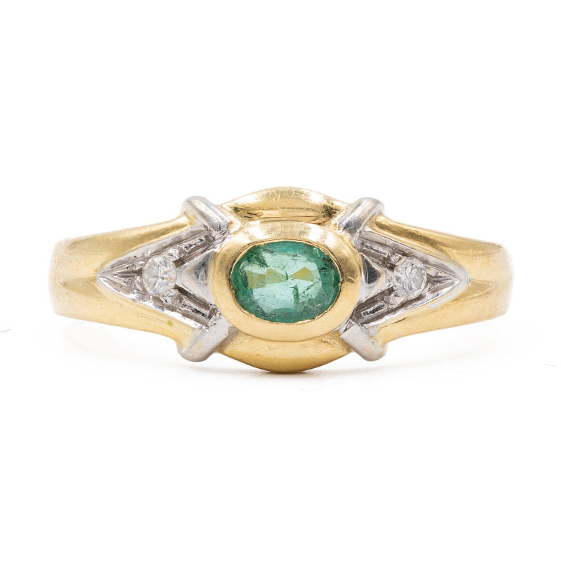 Anello vintage in oro giallo 18K con smeraldo (0.20ct ca.) e diamanti di taglio brillante, anni ‘70