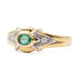 Vintage 18K yellow gold ring with emerald (0.20ct approx.) and brilliant cut diamonds, 70s