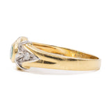 Vintage 18K yellow gold ring with emerald (0.20ct approx.) and brilliant cut diamonds, 70s