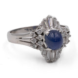 Anello vintage in platino a ballerina con zaffiro cabochon (1.88ct) e diamanti (0,63ctw)