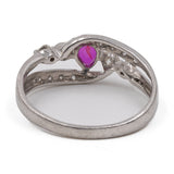 Anello vintage in platino con rubino a goccia (0.37ct) e diamanti (0,43ctw)
