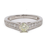 Anello vintage in platino 900 con diamante centrale di 0,33ct e diamanti di contorno di 0,29ctw