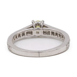 Anello vintage in platino 900 con diamante centrale di 0,33ct e diamanti di contorno di 0,29ctw