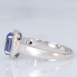 Anello a margherita vintage in oro bianco 18K con tanzanite (2.30ct ca.) e diamanti di taglio brillante (0.20ctw ca.), anno ‘70/‘80