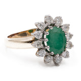 Bague marguerite vintage en or jaune et blanc 14 carats avec émeraude (environ 1.75 ct) et diamants taille brillant (environ 0.72 ct), années 70