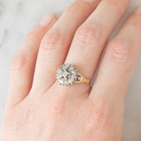 Anello a margherita antico in oro giallo 18K e argento con diamanti di taglio rosetta, primi del ‘900