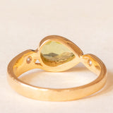 Vintage 18K yellow gold ring with peridot (0.75ct approx.) and diamonds (0.06ctw approx.), 70s/80s