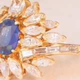 Vintage 18K yellow gold ring with sapphire (1.20ct approx.) and marquise and baguette cut diamonds (2.70ctw approx.), 70s