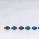 Collana vintage in oro giallo 9K con pirite e pietre blu