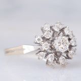 Anello a fuoco d’artificio vintage in oro bianco 18K con diamanti di taglio brillante (0.70ctw ca.), anni ‘70