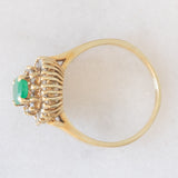 Anello ballerina vintage in oro giallo 14K con smeraldo (0.50ct ca.) e diamanti di taglio brillante e di taglio tapered (0.50ctw ca.), anni ‘70