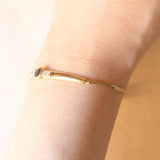 Braccialetto vintage in oro giallo e bianco 9K con zaffiro (0.30ct ca.) e diamanti, anno 1986