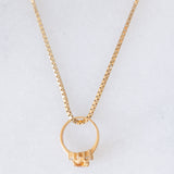 Collana vintage con ciondolo ad anello a margherita in oro giallo 18K con quarzo citrino e diamanti, anni ‘80