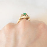 Anello ballerina vintage in oro giallo 14K con smeraldo (0.50ct ca.) e diamanti di taglio brillante e di taglio tapered (0.50ctw ca.), anni ‘70