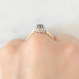 Anello a margherita vintage in oro giallo e bianco 9K con zaffiro (0.30ct ca.) e diamanti (0.10ctw ca.), anni ‘80