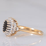 Bague marguerite vintage en or jaune et blanc 9 carats avec saphir (environ 1 ct) et diamants (environ 0.22 ct au total), 1989