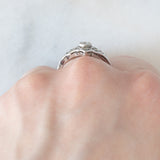 Anello Art Nouveau in oro bianco 18K con diamante di taglio vecchia miniera (0.10ct ca.), anni ‘20/‘30