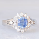 Anello margherita vintage in platino con zaffiro (0.75ct) e diamanti (0.31ctw), anni ‘80
