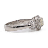 Anello vintage in platino 900 con diamante centrale di 0,46ct e contorno di 0,47ctw