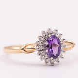 Anello a margherita vintage in oro giallo 9K con ametista (0.40ct ca.) e diamanti (0.16ctw ca.), anni ‘80/‘90