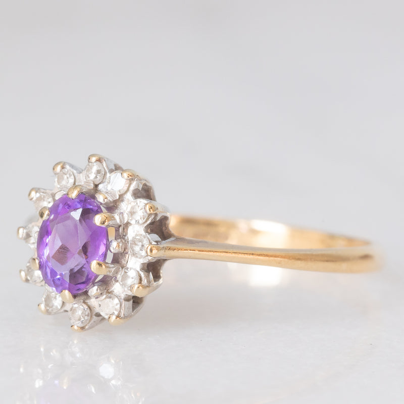 Anello a margherita in oro giallo 9K con ametista (0.35ct ca.) e diamanti (0.06ctw ca.), anno 1987