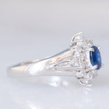 Anello a margherita vintage in platino con zaffiro (0.30ct) e diamanti (0.32ctw), anni ‘80