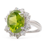Anello a margherita vintage in platino con peridoto (5.64ct) e diamanti (1.05ctw), anni ‘90