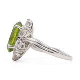 Anello a margherita vintage in platino con peridoto (5.64ct) e diamanti (1.05ctw), anni ‘90