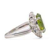 Anello a margherita vintage in platino con peridoto (5.64ct) e diamanti (1.05ctw), anni ‘90