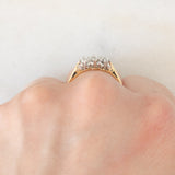 Trilogy antico in oro giallo e bianco 18K con diamanti di taglio brillante (0.40ctw ca.), anni ‘20/‘30