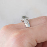 Vintage platinum daisy ring with color-change garnet (approx. 0.35ct) and diamonds (0.58ctw)