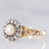 Anello a margherita antico in oro giallo 14K e argento con perla bianca e diamanti di taglio rosetta (0.13ctw ca.), primi del ‘900