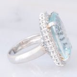 Anello a margherita vintage in platino con acquamarina (17.93ct) e diamanti (1ctw), anni ‘70/‘80