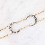 Vintage 18K yellow gold and silver semi-rigid bracelet with crescent-shaped decorations and rose-cut diamonds, 50s