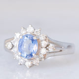 Anello margherita vintage in platino con zaffiro (0.75ct) e diamanti (0.31ctw), anni ‘80