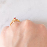 Anello a margherita vintage in oro giallo 18K con rubino (0.51ct) e diamanti (0.41ctw), anni ‘80/‘90