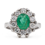 Bague marguerite vintage en or blanc 14 carats avec émeraude (1,30 ct) et diamants (0,90 ct), années 60