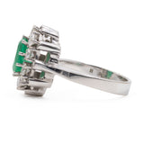 Bague marguerite vintage en or blanc 14 carats avec émeraude (1,30 ct) et diamants (0,90 ct), années 60