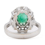 Bague marguerite vintage en or blanc 14 carats avec émeraude (1,30 ct) et diamants (0,90 ct), années 60