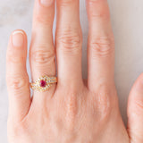 Anello a margherita vintage in oro giallo 18K con rubino (0.51ct) e diamanti (0.41ctw), anni ‘80/‘90