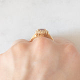 Anello a margherita vintage in oro giallo 14K con rubino (1.50ct ca.) e diamanti (0.16ctw ca.), anni ‘70/‘80