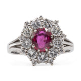 Anel vintage margarida em ouro branco 18k com rubi (1 quilate) e diamantes (1,16 quilates), década de 70