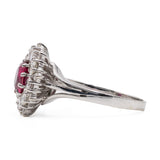 Anel vintage margarida em ouro branco 18k com rubi (1 quilate) e diamantes (1,16 quilates), década de 70