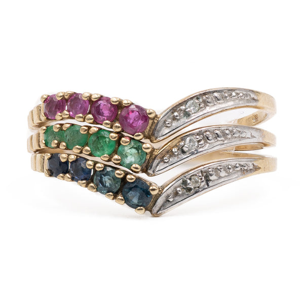 Tre anelli vintage a V in oro 8k con smeraldi, rubini, zaffiri e diamanti