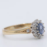 Anello a margherita vintage in oro giallo 9K con zaffiro (0.36ct ca.) e diamanti (0.12ctw ca.), anno 1989